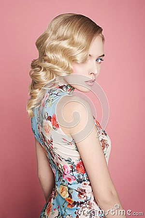 Blonde woman with color makup on colorful background Stock Photo