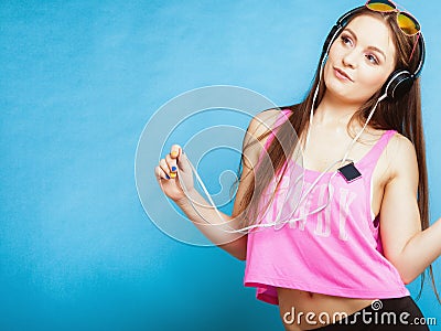 Fashion teen girl listen music mp3 relax happy and dancing Stock Photo