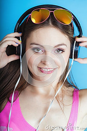 Fashion teen girl listen music mp3 relax happy and dancing Stock Photo