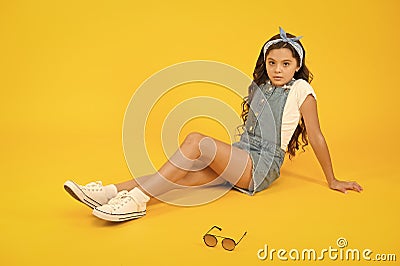 Fashion trend. Little fashionista. Cute small kid fashion girl. Fashion accessories. Summer outfit concept. Girl long Stock Photo