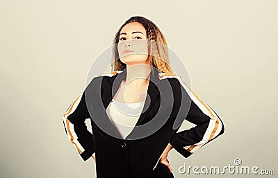 Fashion trend. Voluminous crimped hairstyle. Trendy crimped hairstyle. Sport chic. Mixing elegant and athletic pieces Stock Photo