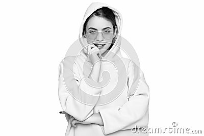 Fashion woman biting nails in casual pink hoodie hooded sweatshirt isolated on white Stock Photo