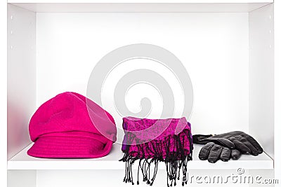 Fashion women accessories on white shelf in dressing room Stock Photo