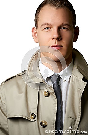 Fashion young man with trenchcoat Stock Photo