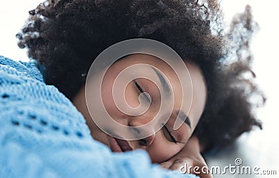 Fashionable Beautiful African American woman enjoy listening favorite music in headphones, closing her eyes from pleasure, music Stock Photo