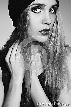 Fashionable beautiful young woman in hat. beauty blond girl in cap Stock Photo