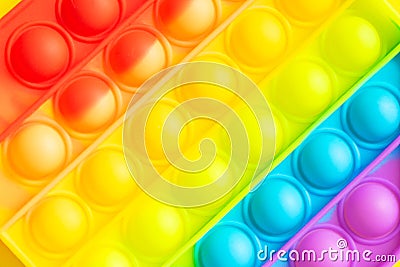 Fashionable bright toys antistress pop funny colored soft bubbles close-up. Soft Bubble Silicone Toy for Stress Relief Stock Photo