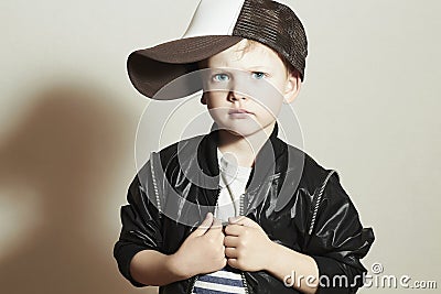 Fashionable Child.stylish little boy in tracker Cap.fashion children Stock Photo