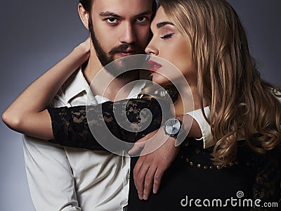 Fashionable couple. Beautiful woman near the man Stock Photo