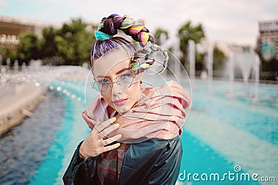 Fashionable Funky Girl Portrait with an extravagant look on streets Stock Photo