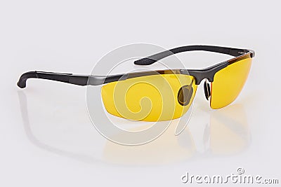 Fashionable glasses with yellow lenses. Night glasses eye wear for car drivers. Stock Photo