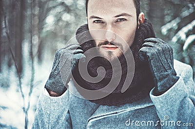 Fashionable handsome man in winter coat Stock Photo