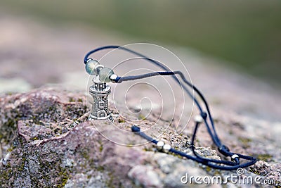 Fashionable lighthouse silver pendant Stock Photo