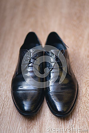 Fashionable mens black shoes on a floor Stock Photo