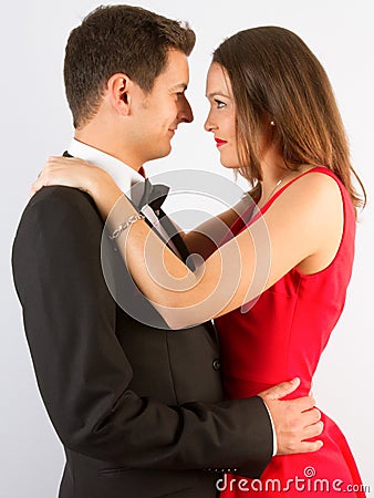 Fashionable picture of young people couple elegant kiss and hug Stock Photo