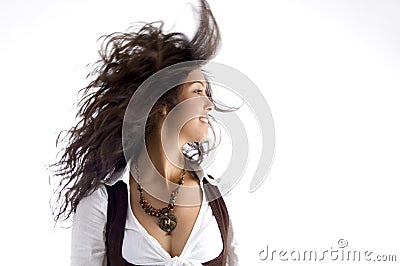 Fashionable teen with her hair fluttering in air Stock Photo