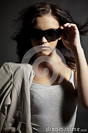 Fashionable teen in sunglasses Stock Photo