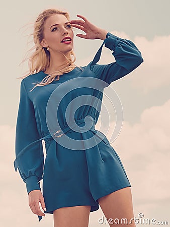 Fashion model wearing blue jumpsuit Stock Photo
