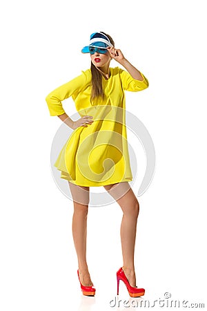 Fashionable Woman In Yellow Mini Dress Stock Photo