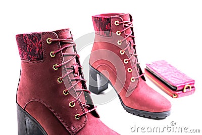 Fashionable women's demi-season ankle boots in cherry. Isolated on white background Stock Photo