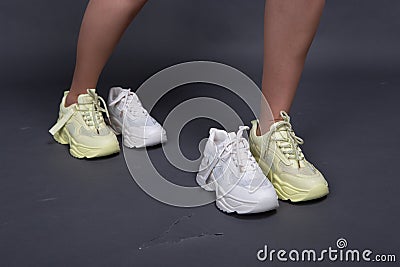 fashionable youth shoes sneakers feet comfort model Stock Photo