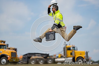 Fast building. Funny construction worker jumping. Excited jump of builders run in helmet. Worker in hardhat Stock Photo