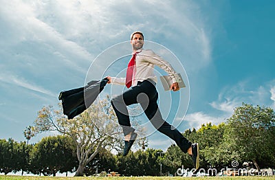 Fast business concept. Running businessman ready to run jump and sprint. Stock Photo