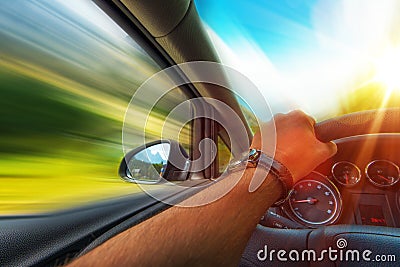 Fast Car Driving Stock Photo