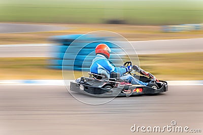 Fast carting car on track Stock Photo