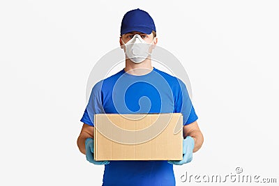 Fast delivery parcels. Courier in blue uniform Stock Photo