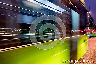 Fast driving bus Stock Photo