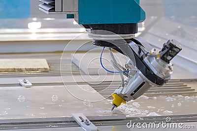 Fast extreme cnc automatic waterjet cutting machine working with sheet metal Stock Photo
