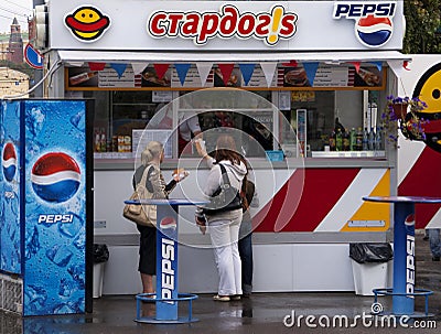 Fast food booth with Pepsi advertisements on Moscow street. Editorial Stock Photo