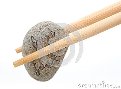 Fast food concept chopstick with stone Stock Photo