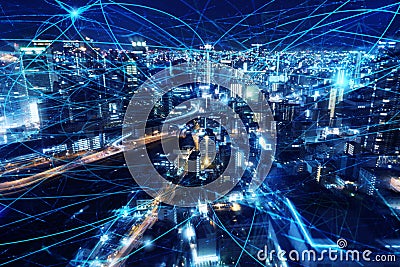 Fast internet connection in the city at night. Concept of technology and innovation Stock Photo