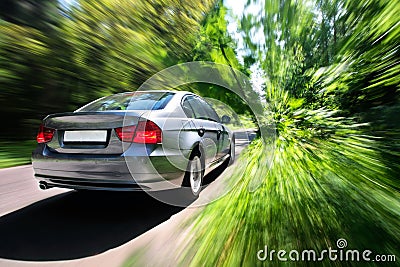 Fast moving car Stock Photo
