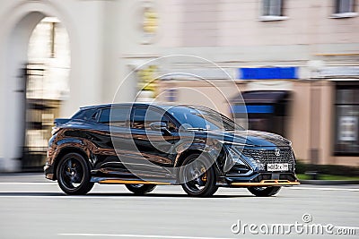 Fast moving Changan UNI-T on the city road. Black SUV driving on motorway. Modern Chinese auto in fast motion with blurred Editorial Stock Photo