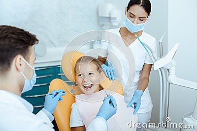 Fast, painless and modern examination and treatment of oral cavity Stock Photo