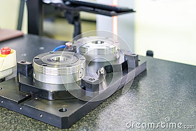Fast or quick flexible holder clamp for catch product workpiece for robot of cnc machining center on work table Stock Photo