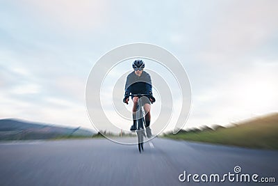 Fast, race and cycling with woman in road for training, competition and championship. Workout, sports and triathlon with Stock Photo