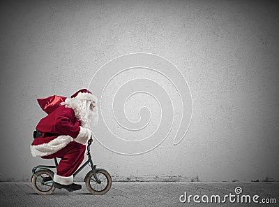 Fast Santa Claus on the bike Stock Photo