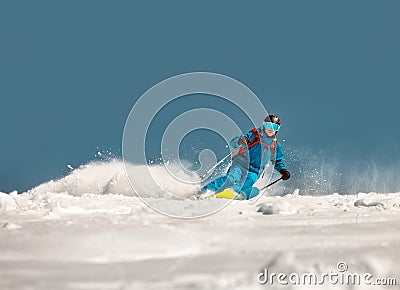 Fast skier downhill at ski resort Stock Photo