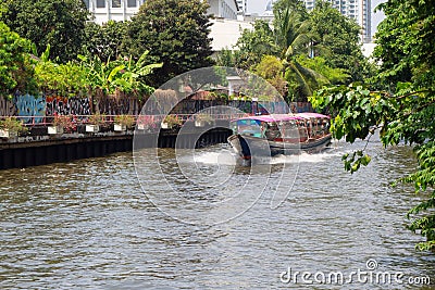 Fast speed express boat on Khlong Saen Seap river in downtown Bangkok Editorial Stock Photo