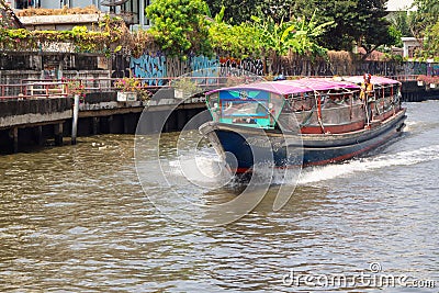 Fast speed express boat on Khlong Saen Seap river in downtown Bangkok Editorial Stock Photo