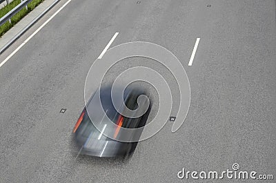 Fast speeding car Stock Photo