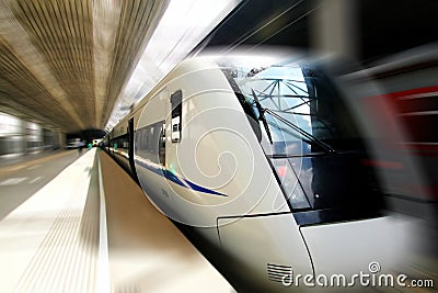 Fast train in motion Stock Photo