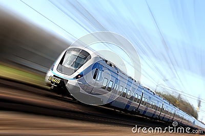 Fast train in motion Stock Photo