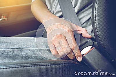 Fasten the car seat belt. Stock Photo