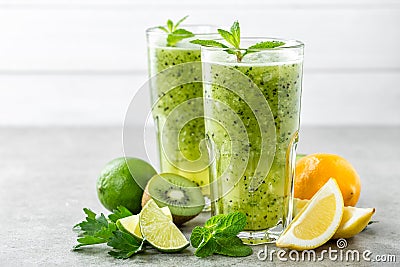 Fat burning green fruit cocktail with kiwi, lemon, mint and parsley Stock Photo