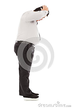 Fat business man too unbelievable his weight to hold head Stock Photo